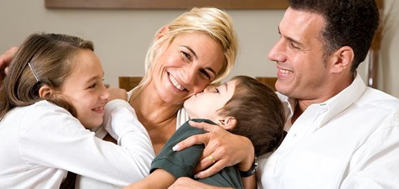 family with special needs child at dentist